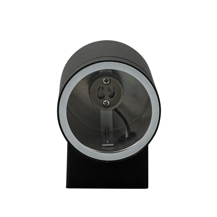 Cylindrisk armatur, åbent forrest og med synlig pærefatning og ledning, monteret på en sort rektangulær base; isoleret på hvid baggrund.