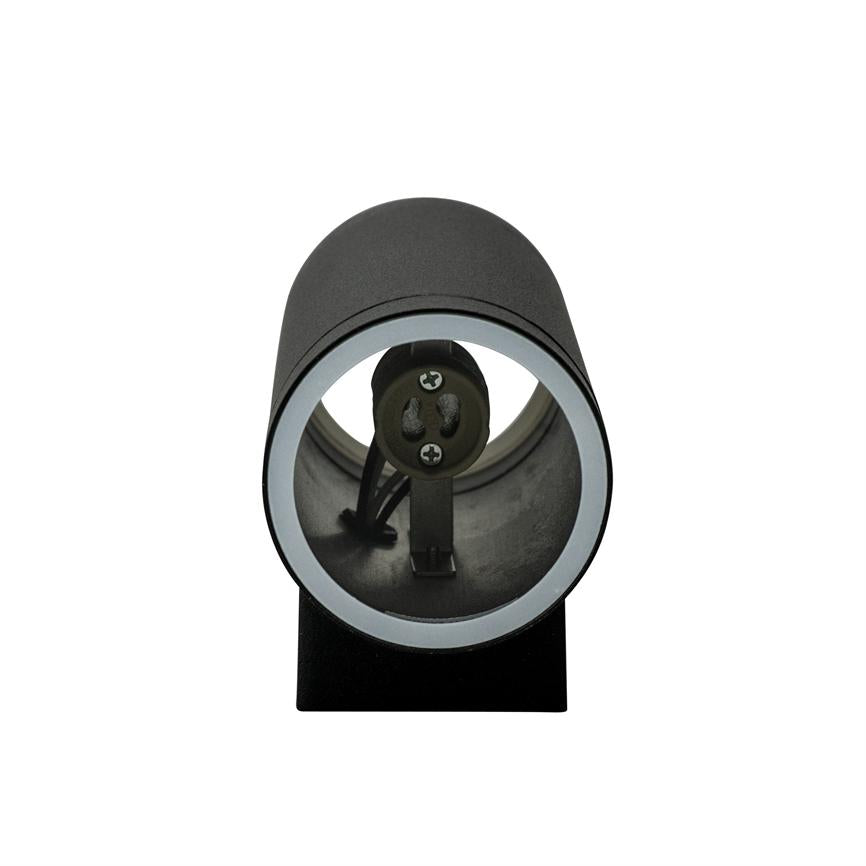 Cylinderformet sort spotlight-hus, viser en tom pæreholder fastgjort med to skruer; kabler ses inden i, monteret på en lille sort firkantet base mod hvid baggrund.