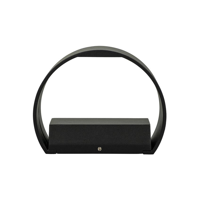 Sort ringformet lampe omslutter en lav rektangulær base; monteringsskrue er synlig foran, placeret på en ensartet hvid baggrund.