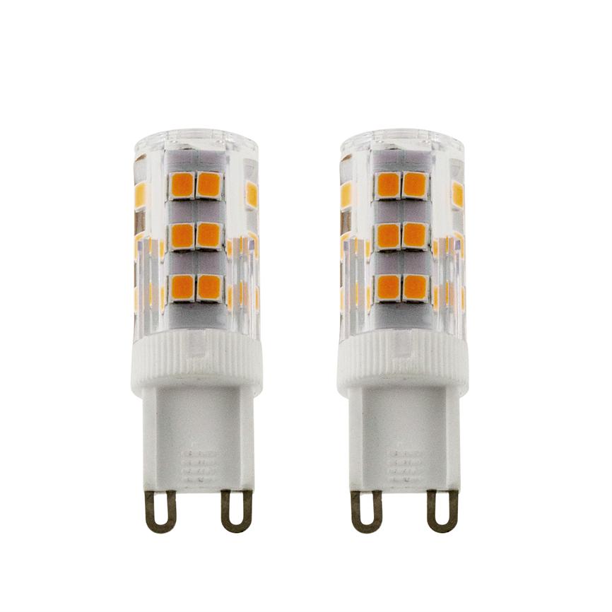 To G9 LED-pærer står vertikalt side om side; hver med gennemsigtig plastkappe, synlige gule LED-chips i rækker og hvide plastbaser med dobbelte metalben på hvid baggrund.