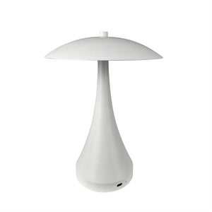 Hvid bordlampe i svampeform står slukket på en hvid, ensartet baggrund; slank stok og rund skærm, synlig lille USB-port ved bunden.